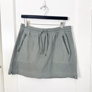 Athleta Farallon Mid Rise Skirt Semi Fitted Fern Green Activewear Hiking Size 10